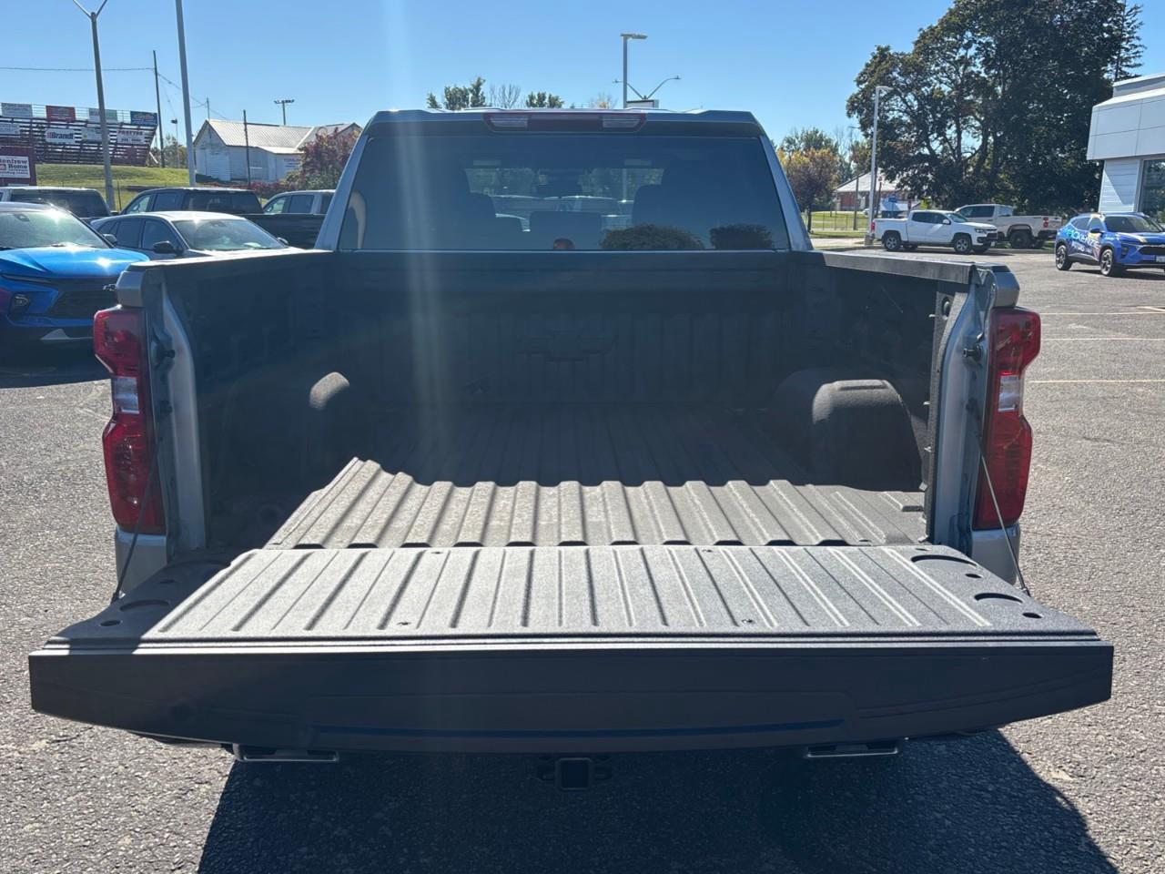 2026 Chevrolet Silverado 1500 Custom Trail Boss New 2026 Gas Powered V8 6 Passenger Crew Cab 4X4 Truck with a 2 Factory Installed Lift, Push Button Start with Remote Vehicle Start and a 7 Diagonal Touchscreen Radio with Wireless Apple CarPlay and W Photo