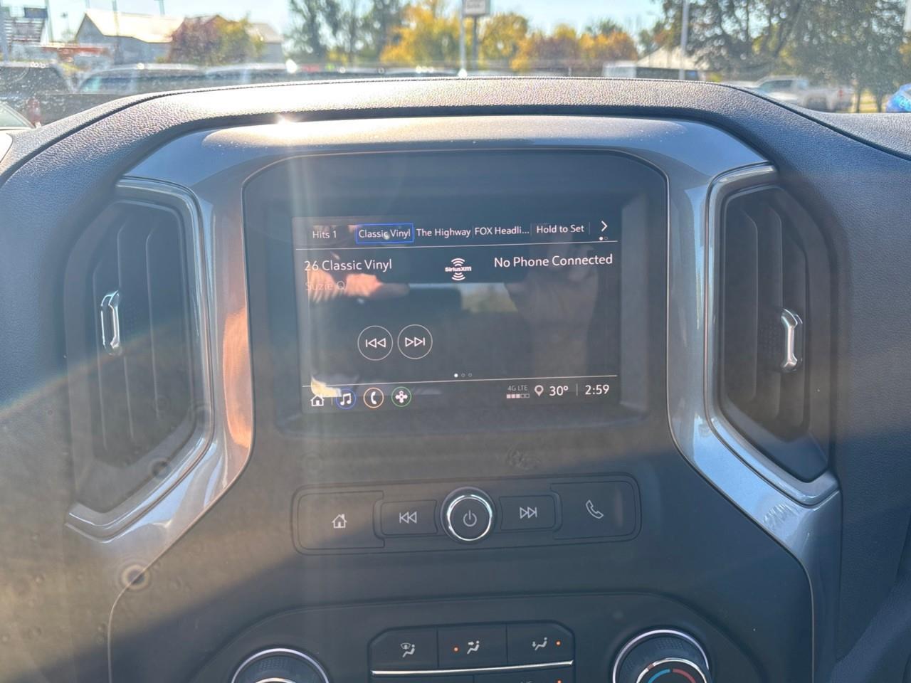 2026 Chevrolet Silverado 1500 Custom Trail Boss New 2026 Gas Powered V8 6 Passenger Crew Cab 4X4 Truck with a 2 Factory Installed Lift, Push Button Start with Remote Vehicle Start and a 7 Diagonal Touchscreen Radio with Wireless Apple CarPlay and W Photo