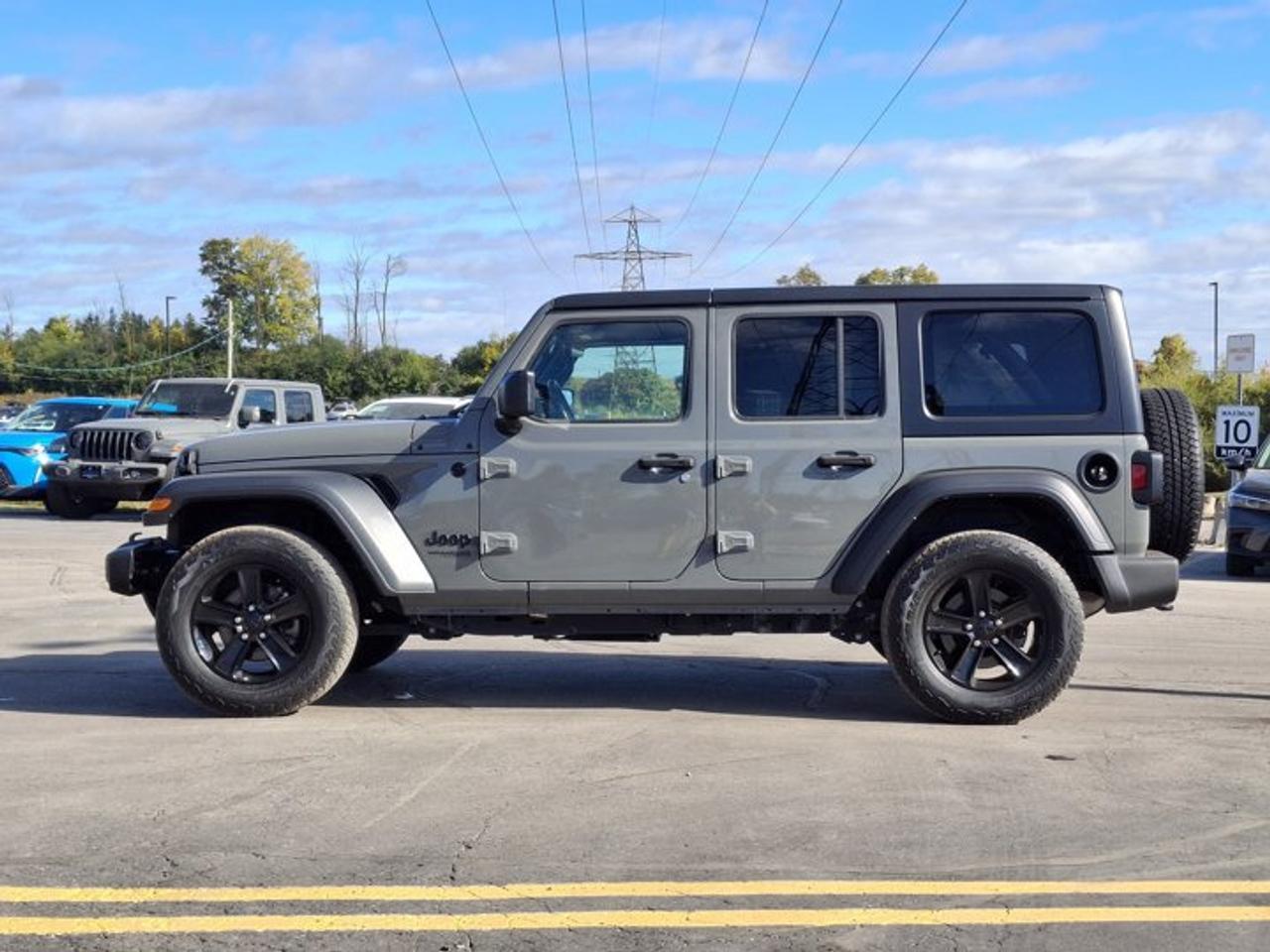 2022 Jeep Wrangler Unlimited Sport Altitude 4x4 | 6-Speed Manual | Heated Seats + Steering | Nav and Sound Group & More Photo