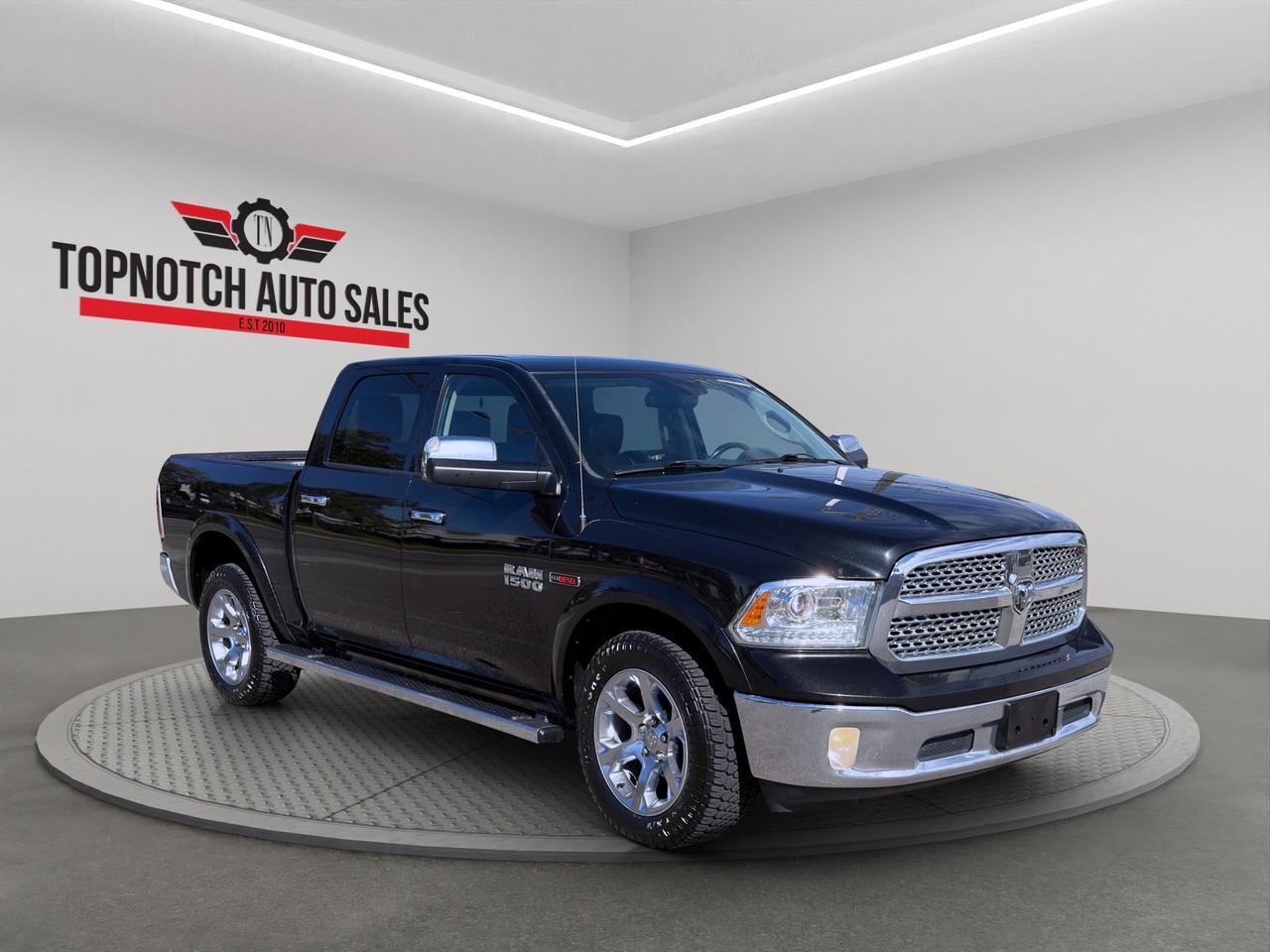 2017 RAM 1500 4WD Crew Cab 140.5" Laramie Photo