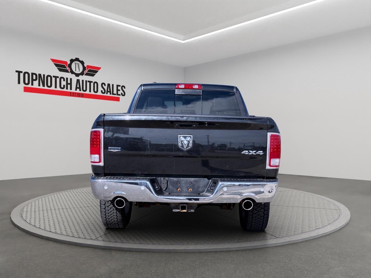 2017 RAM 1500 4WD Crew Cab 140.5" Laramie Photo