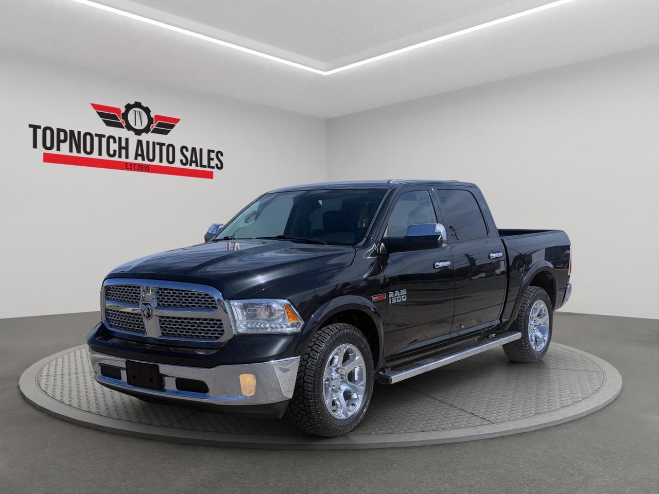 2017 RAM 1500 4WD Crew Cab 140.5" Laramie Photo