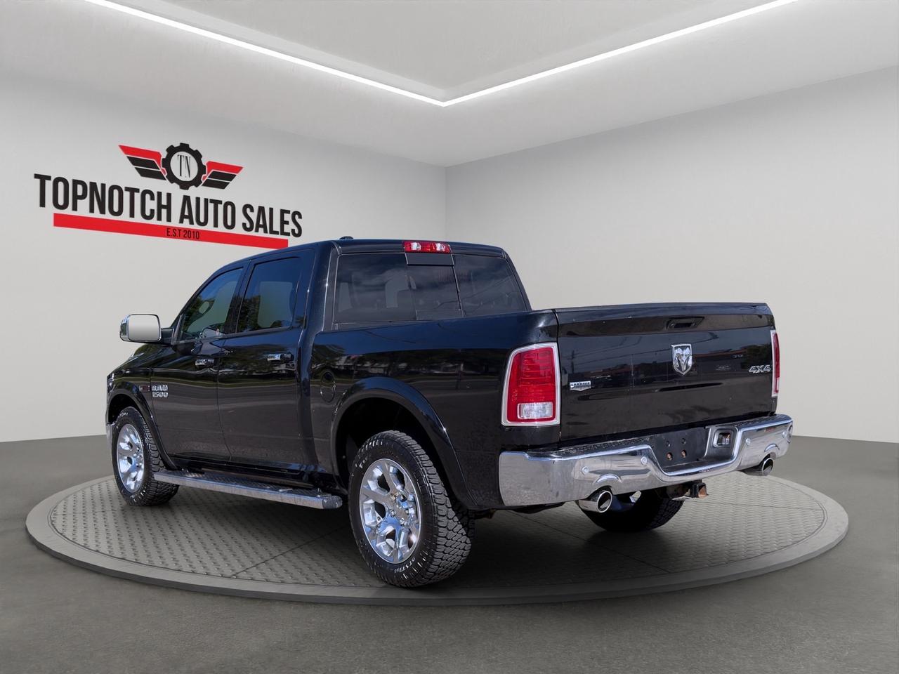 2017 RAM 1500 4WD Crew Cab 140.5" Laramie Photo
