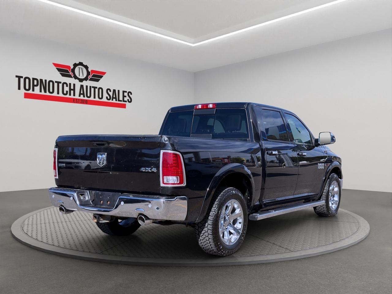 2017 RAM 1500 4WD Crew Cab 140.5" Laramie Photo