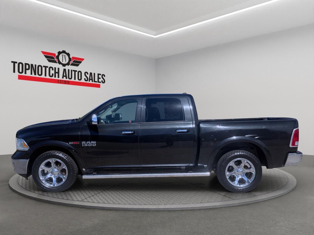 2017 RAM 1500 4WD Crew Cab 140.5" Laramie Photo