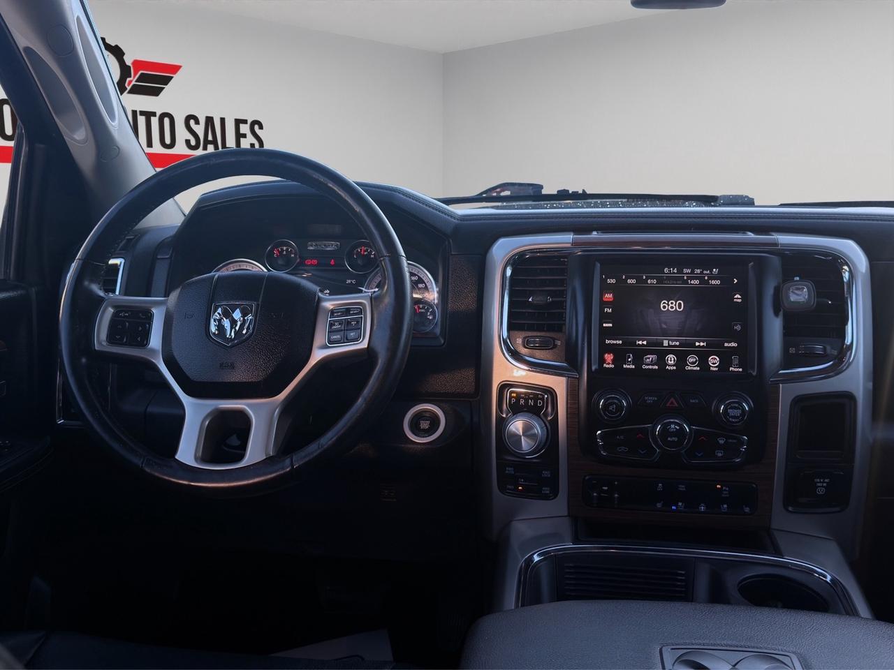 2017 RAM 1500 4WD Crew Cab 140.5" Laramie Photo