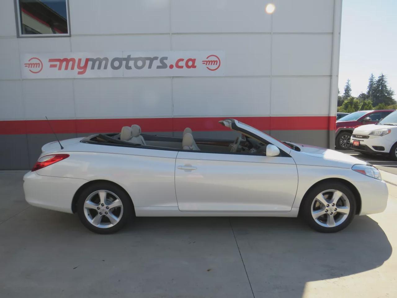 2008 Toyota Camry Solara SLE | FWD | Automatic | Convertible | Alloy Wheels | Leather Seats | Heated Seats | Power Driver Seat | Climate Control | Power Convertible Top | JBL Premium Sound System | 6-Disc CD Changer | AUX Input | Satellite Radio | Bluetooth | Cruise Control | Aut Photo5