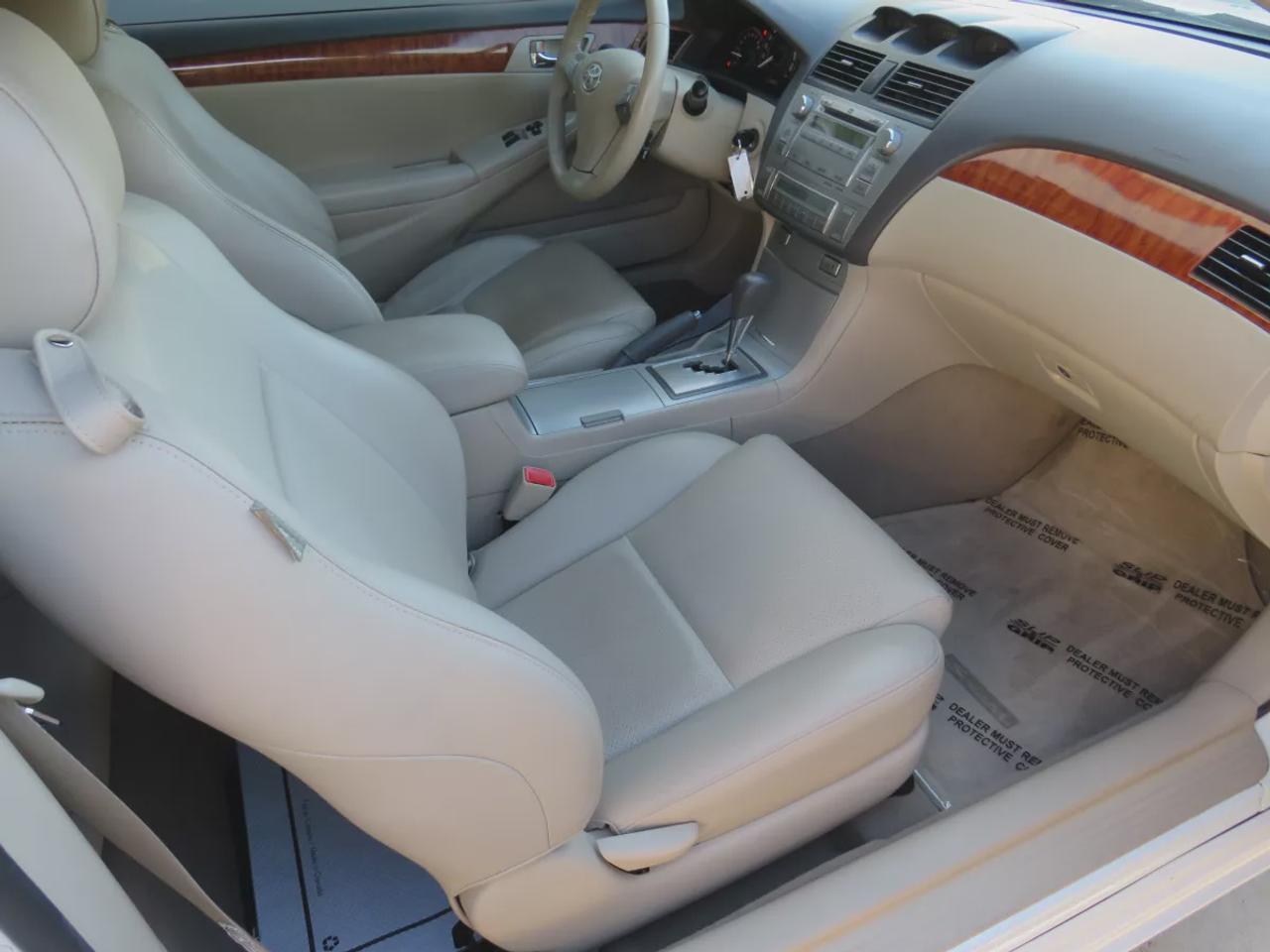 2008 Toyota Camry Solara SLE | FWD | Automatic | Convertible | Alloy Wheels | Leather Seats | Heated Seats | Power Driver Seat | Climate Control | Power Convertible Top | JBL Premium Sound System | 6-Disc CD Changer | AUX Input | Satellite Radio | Bluetooth | Cruise Control | Aut Photo