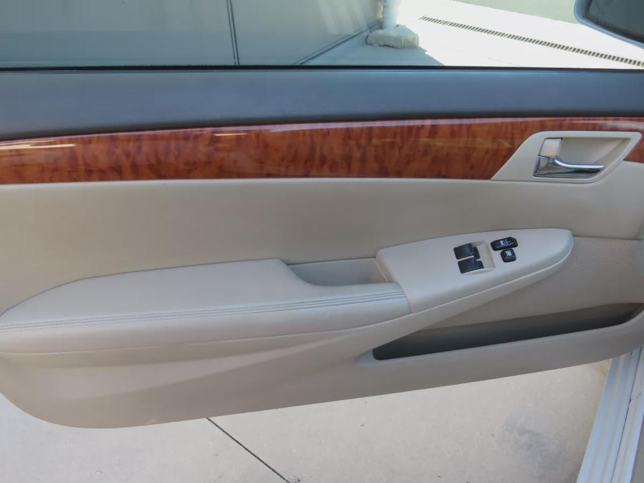2008 Toyota Camry Solara SLE | FWD | Automatic | Convertible | Alloy Wheels | Leather Seats | Heated Seats | Power Driver Seat | Climate Control | Power Convertible Top | JBL Premium Sound System | 6-Disc CD Changer | AUX Input | Satellite Radio | Bluetooth | Cruise Control | Aut Photo