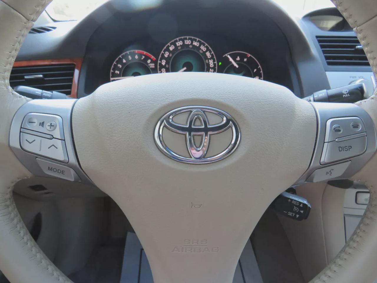 2008 Toyota Camry Solara SLE | FWD | Automatic | Convertible | Alloy Wheels | Leather Seats | Heated Seats | Power Driver Seat | Climate Control | Power Convertible Top | JBL Premium Sound System | 6-Disc CD Changer | AUX Input | Satellite Radio | Bluetooth | Cruise Control | Aut Photo