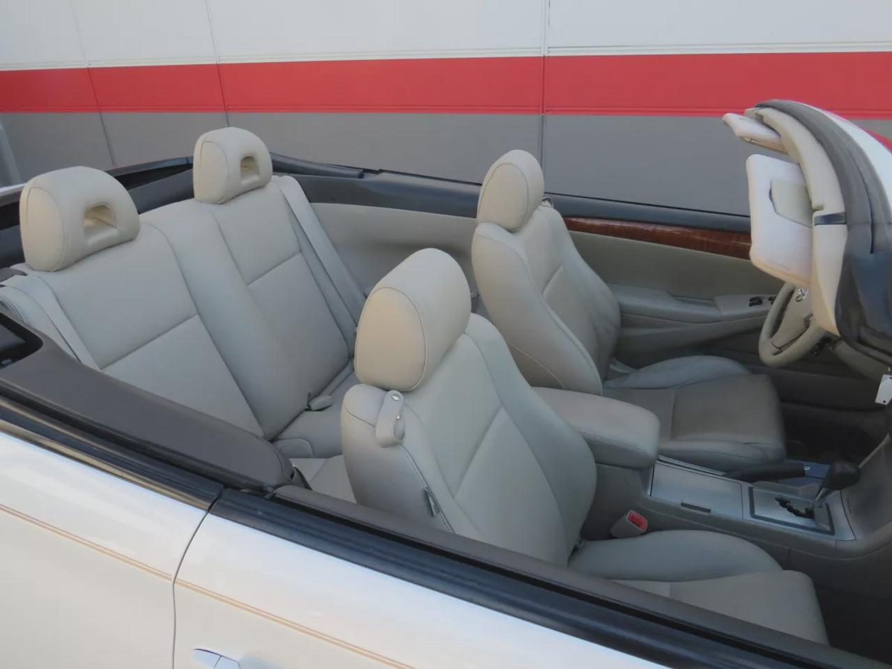 2008 Toyota Camry Solara SLE | FWD | Automatic | Convertible | Alloy Wheels | Leather Seats | Heated Seats | Power Driver Seat | Climate Control | Power Convertible Top | JBL Premium Sound System | 6-Disc CD Changer | AUX Input | Satellite Radio | Bluetooth | Cruise Control | Aut Photo
