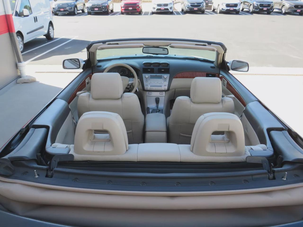 2008 Toyota Camry Solara SLE | FWD | Automatic | Convertible | Alloy Wheels | Leather Seats | Heated Seats | Power Driver Seat | Climate Control | Power Convertible Top | JBL Premium Sound System | 6-Disc CD Changer | AUX Input | Satellite Radio | Bluetooth | Cruise Control | Aut Photo