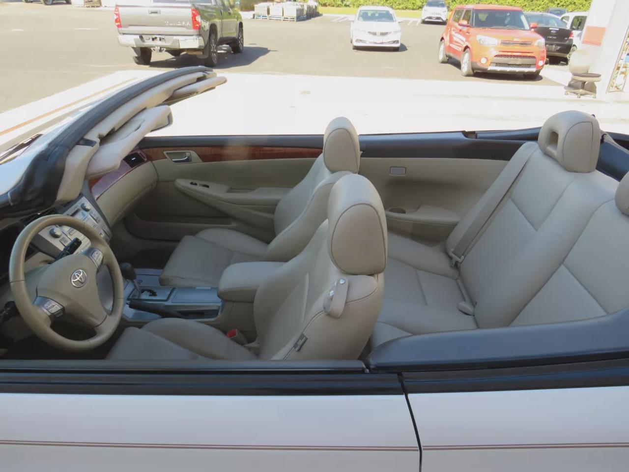 2008 Toyota Camry Solara SLE | FWD | Automatic | Convertible | Alloy Wheels | Leather Seats | Heated Seats | Power Driver Seat | Climate Control | Power Convertible Top | JBL Premium Sound System | 6-Disc CD Changer | AUX Input | Satellite Radio | Bluetooth | Cruise Control | Aut Photo