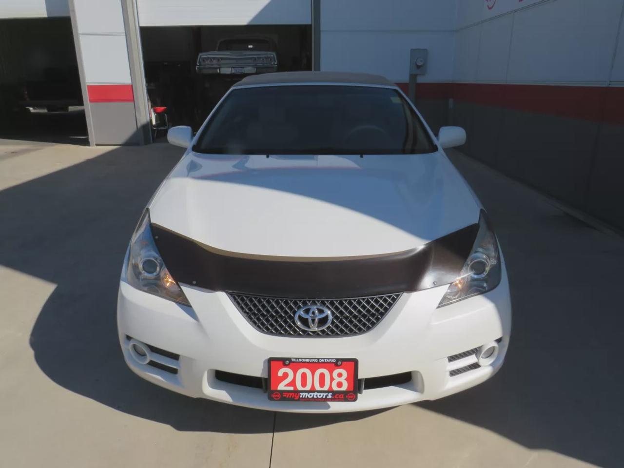 2008 Toyota Camry Solara SLE | FWD | Automatic | Convertible | Alloy Wheels | Leather Seats | Heated Seats | Power Driver Seat | Climate Control | Power Convertible Top | JBL Premium Sound System | 6-Disc CD Changer | AUX Input | Satellite Radio | Bluetooth | Cruise Control | Aut Photo