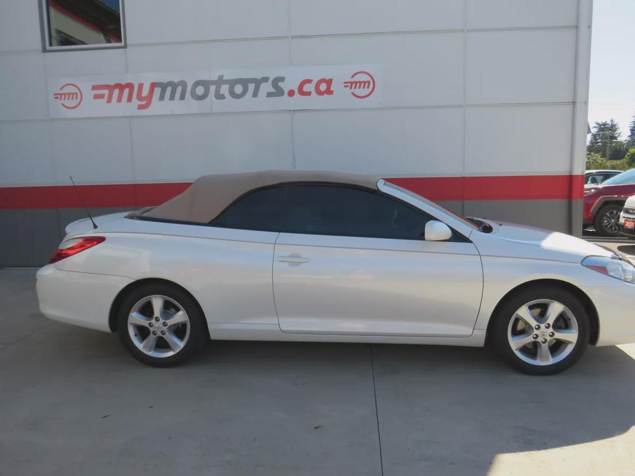 2008 Toyota Camry Solara SLE | FWD | Automatic | Convertible | Alloy Wheels | Leather Seats | Heated Seats | Power Driver Seat | Climate Control | Power Convertible Top | JBL Premium Sound System | 6-Disc CD Changer | AUX Input | Satellite Radio | Bluetooth | Cruise Control | Aut Photo