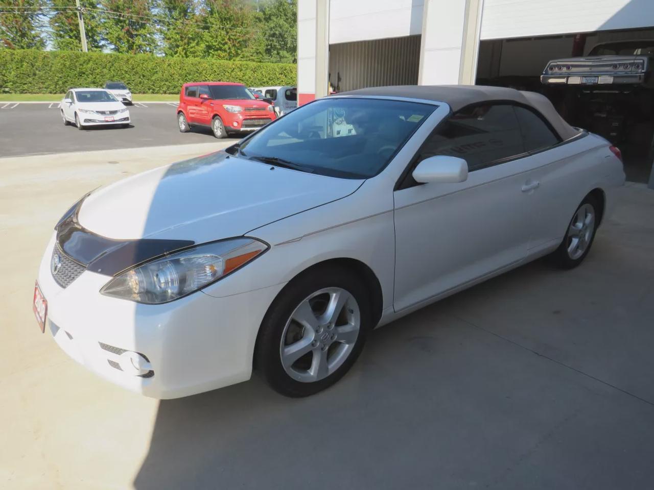 2008 Toyota Camry Solara SLE | FWD | Automatic | Convertible | Alloy Wheels | Leather Seats | Heated Seats | Power Driver Seat | Climate Control | Power Convertible Top | JBL Premium Sound System | 6-Disc CD Changer | AUX Input | Satellite Radio | Bluetooth | Cruise Control | Aut Photo