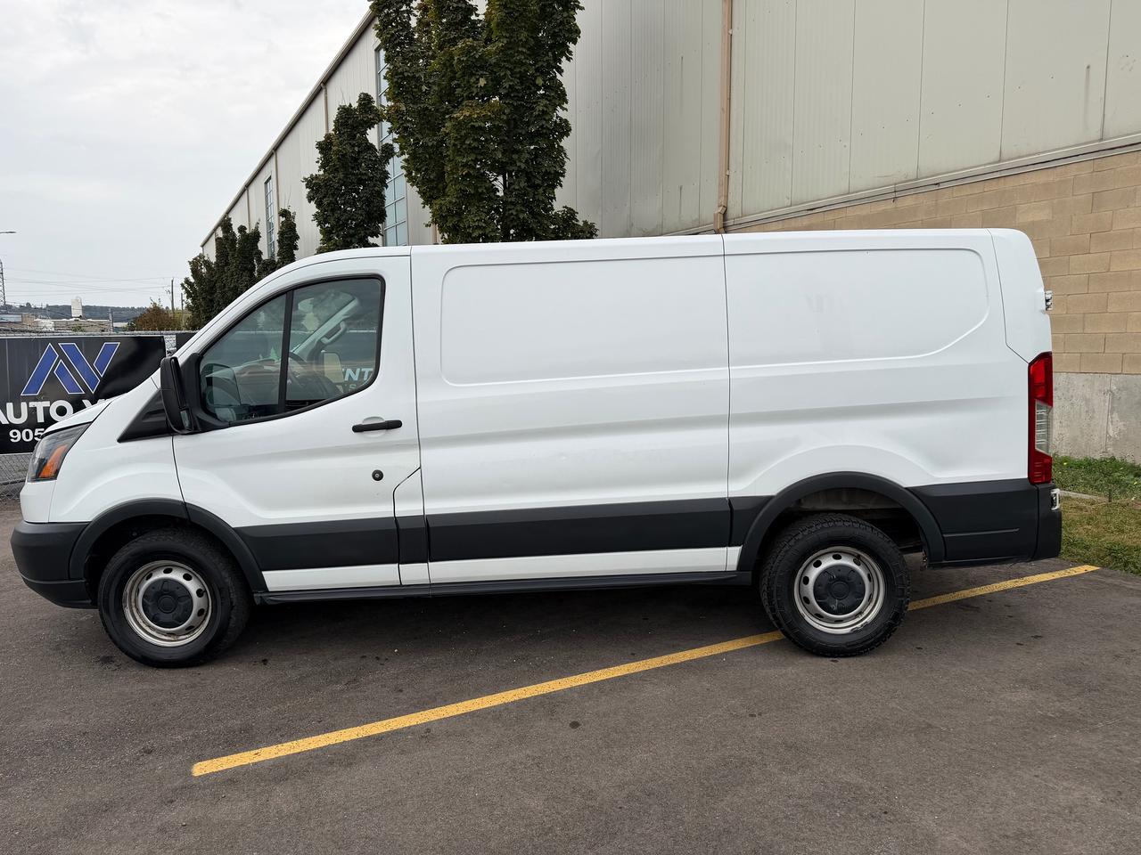 2017 Ford Transit Cargo Van T-150 130" Low Rf 8600 GVWR Sliding RH Dr Photo