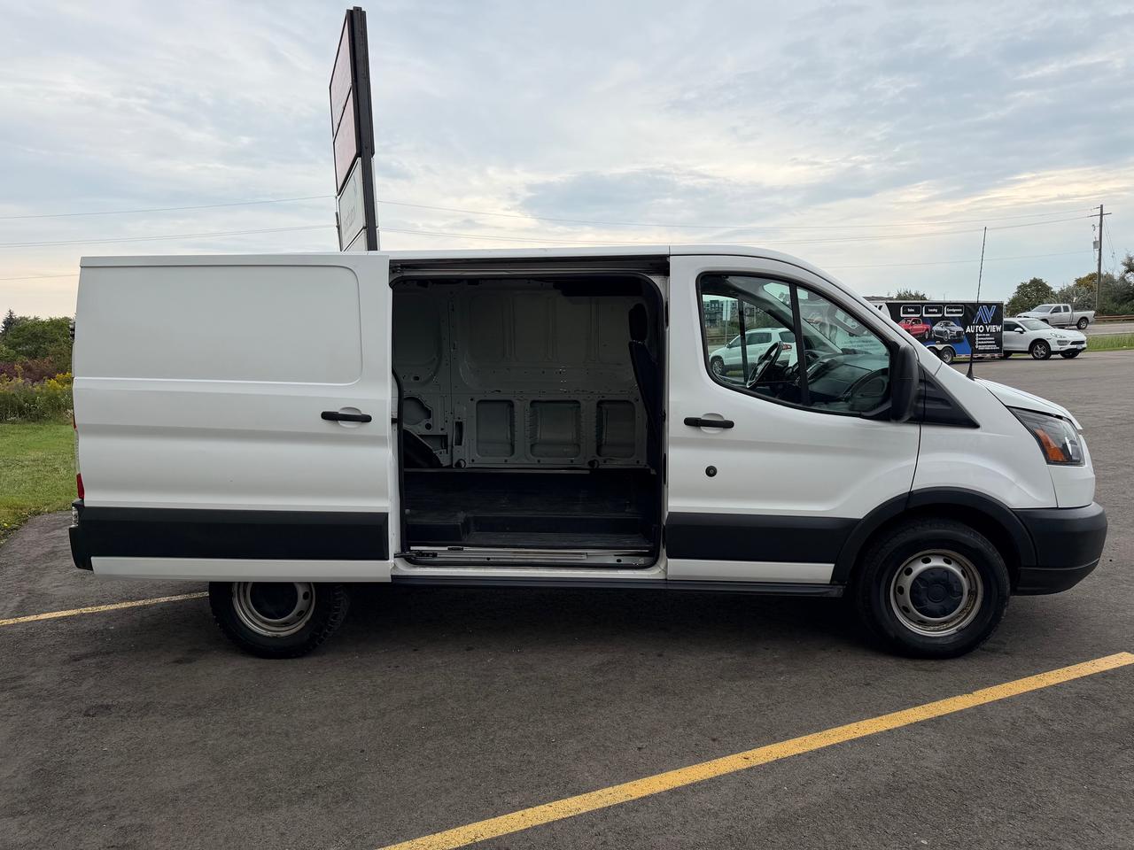 2017 Ford Transit Cargo Van T-150 130" Low Rf 8600 GVWR Sliding RH Dr Photo