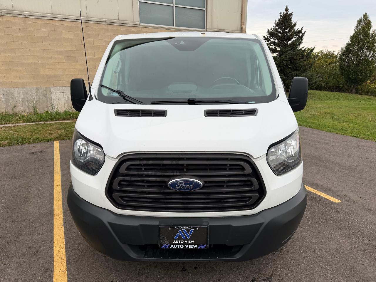 2017 Ford Transit Cargo Van T-150 130" Low Rf 8600 GVWR Sliding RH Dr Photo1