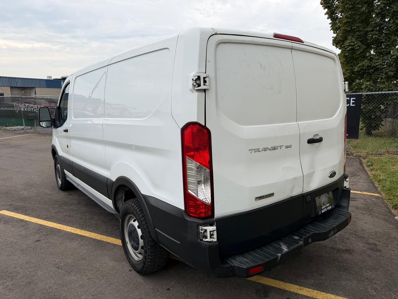 2017 Ford Transit Cargo Van T-150 130" Low Rf 8600 GVWR Sliding RH Dr Photo
