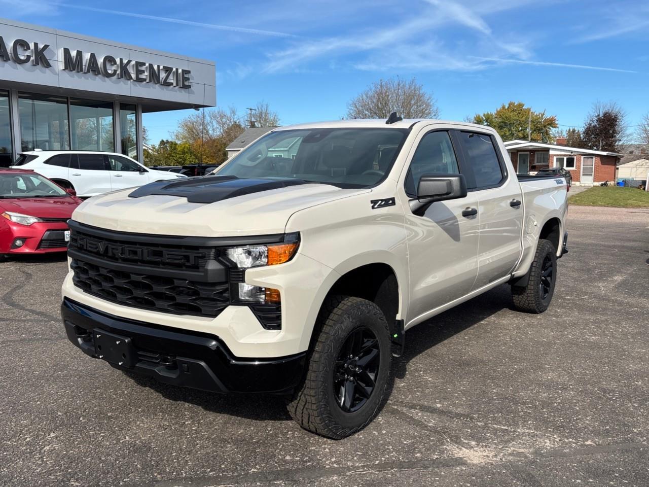 2026 Chevrolet Silverado 1500 Custom Trail Boss New 2026 Gas Powered V8 6 Passenger Crew Cab 4X4 Truck with a 2 Factory Installed Lift, Push Button Start with Remote Vehicle Start and a 7 Diagonal Touchscreen Radio with Wireless Apple CarPlay and W Photo