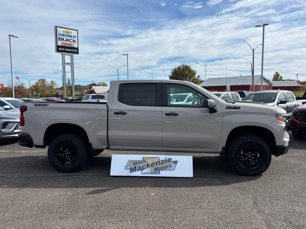 2026 Chevrolet Silverado 1500 Custom Trail Boss New 2026 Gas Powered V8 6 Passenger Crew Cab 4X4 Truck with a 2 Factory Installed Lift, Push Button Start with Remote Vehicle Start and a 7 Diagonal Touchscreen Radio with Wireless Apple CarPlay and W Photo