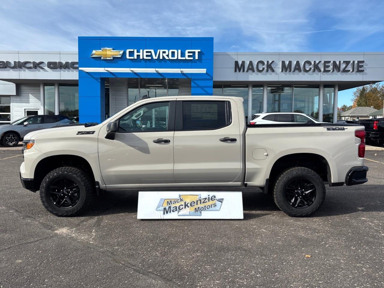 2026 Chevrolet Silverado 1500 Custom Trail Boss New 2026 Gas Powered V8 6 Passenger Crew Cab 4X4 Truck with a 2 Factory Installed Lift, Push Button Start with Remote Vehicle Start and a 7 Diagonal Touchscreen Radio with Wireless Apple CarPlay and W Photo