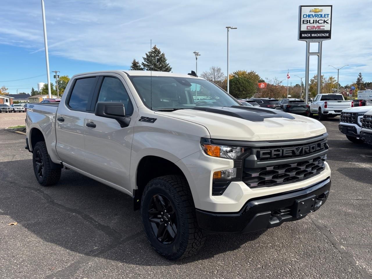 2026 Chevrolet Silverado 1500 Custom Trail Boss New 2026 Gas Powered V8 6 Passenger Crew Cab 4X4 Truck with a 2 Factory Installed Lift, Push Button Start with Remote Vehicle Start and a 7 Diagonal Touchscreen Radio with Wireless Apple CarPlay and W Photo