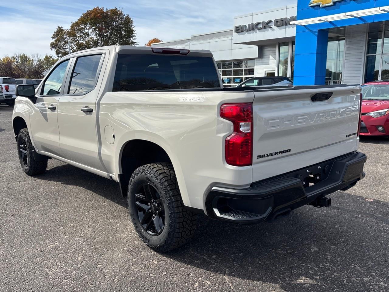 2026 Chevrolet Silverado 1500 Custom Trail Boss New 2026 Gas Powered V8 6 Passenger Crew Cab 4X4 Truck with a 2 Factory Installed Lift, Push Button Start with Remote Vehicle Start and a 7 Diagonal Touchscreen Radio with Wireless Apple CarPlay and W Photo