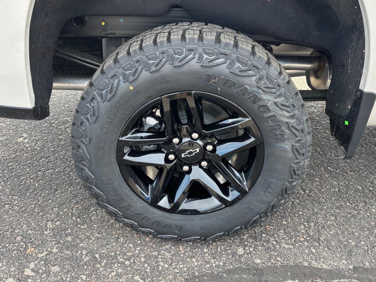 2026 Chevrolet Silverado 1500 Custom Trail Boss New 2026 Gas Powered V8 6 Passenger Crew Cab 4X4 Truck with a 2 Factory Installed Lift, Push Button Start with Remote Vehicle Start and a 7 Diagonal Touchscreen Radio with Wireless Apple CarPlay and W Photo