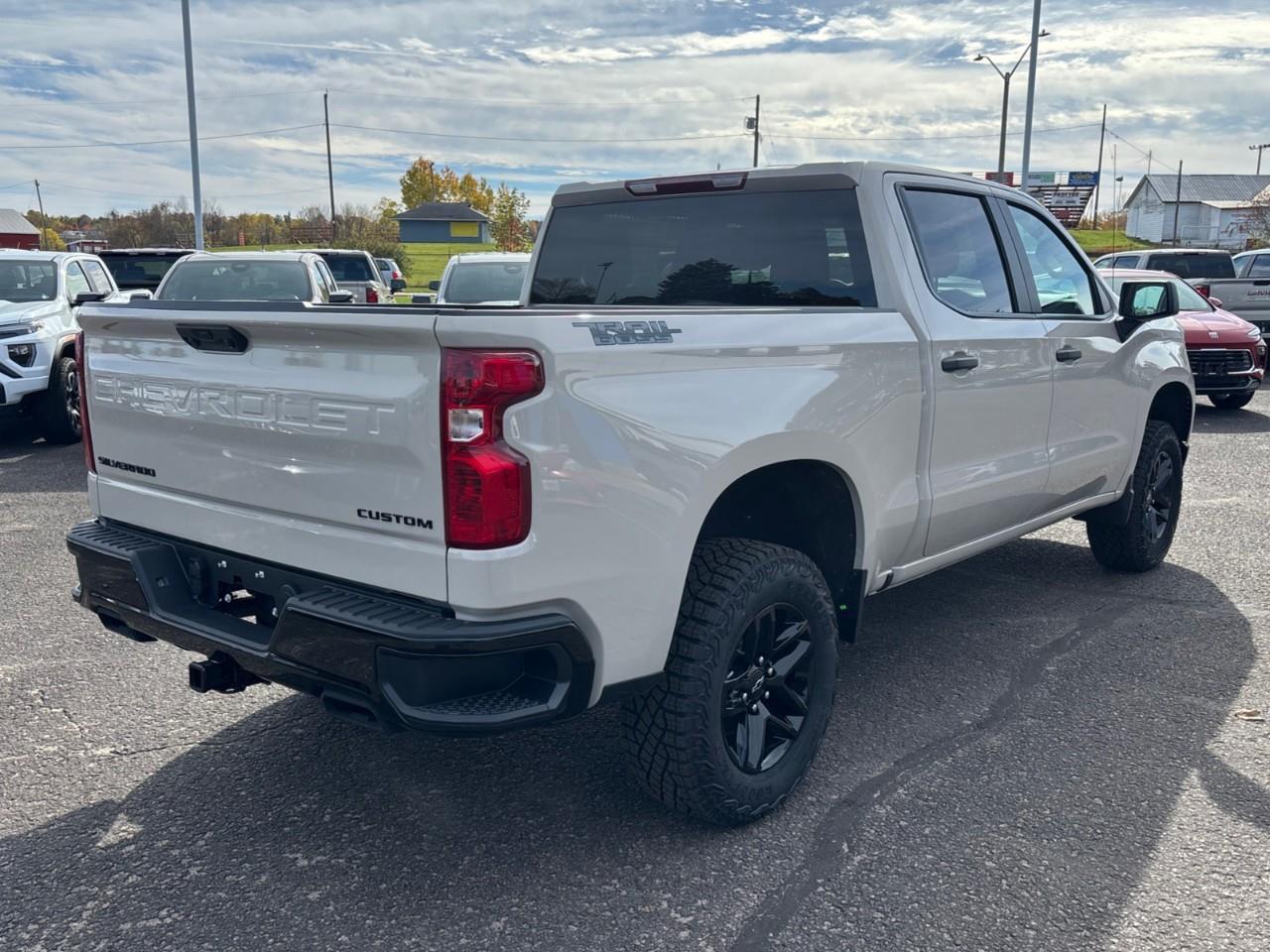2026 Chevrolet Silverado 1500 Custom Trail Boss New 2026 Gas Powered V8 6 Passenger Crew Cab 4X4 Truck with a 2 Factory Installed Lift, Push Button Start with Remote Vehicle Start and a 7 Diagonal Touchscreen Radio with Wireless Apple CarPlay and W Photo3