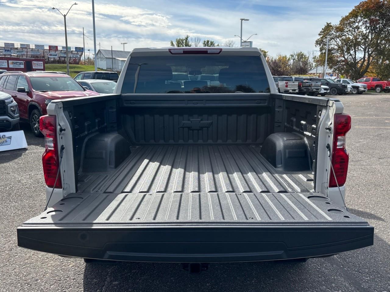 2026 Chevrolet Silverado 1500 Custom Trail Boss New 2026 Gas Powered V8 6 Passenger Crew Cab 4X4 Truck with a 2 Factory Installed Lift, Push Button Start with Remote Vehicle Start and a 7 Diagonal Touchscreen Radio with Wireless Apple CarPlay and W Photo