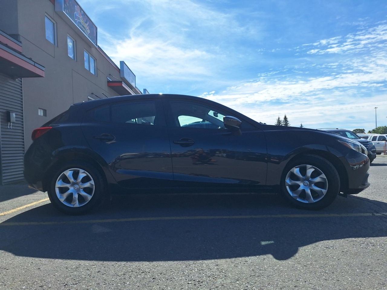 2015 Mazda MAZDA3 4dr HB Sport Auto GX Photo3