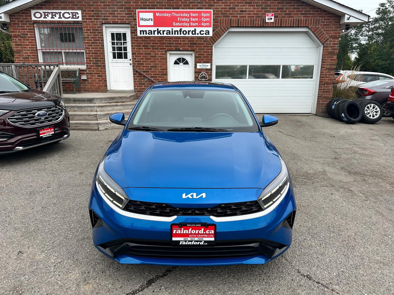 2023 Kia Forte EX HTD-Cloth A/C CarPlay HD-FM Backup Cam Alloys Photo1