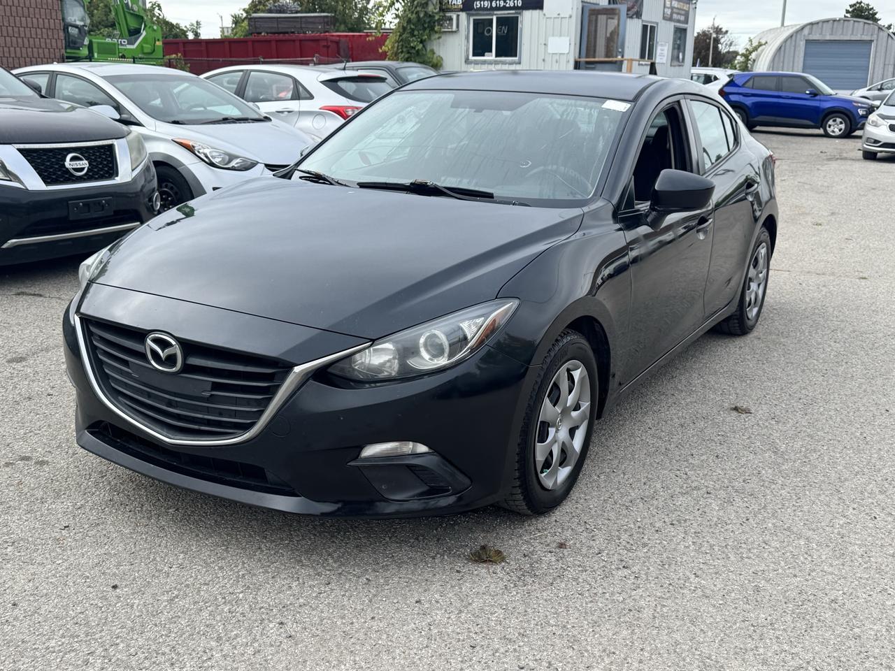Black 2015 Mazda MAZDA3 Sedan  Automatic