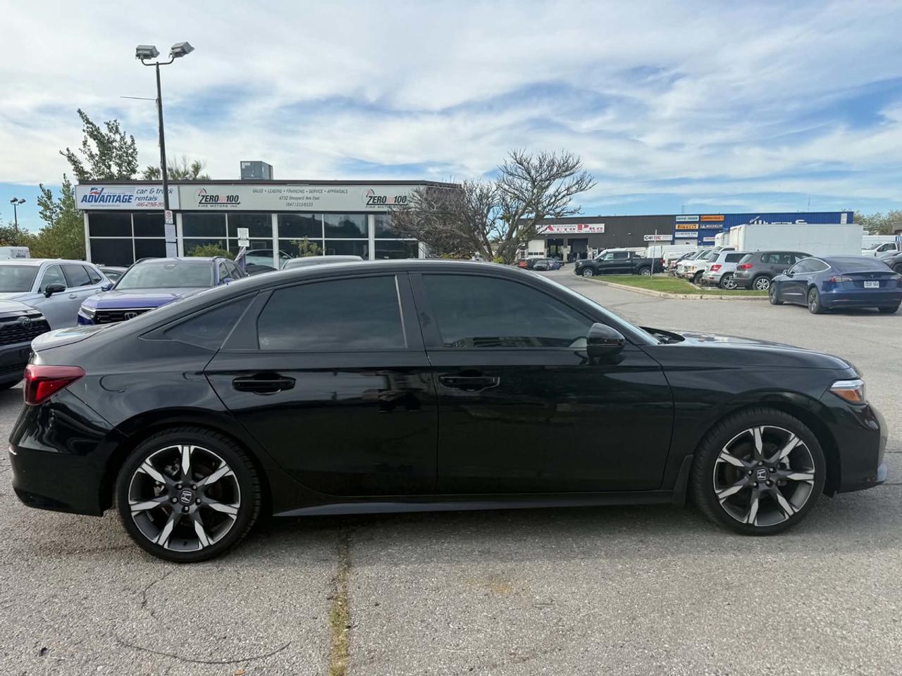 2025 Honda Civic Hybrid Sport Touring Photo2