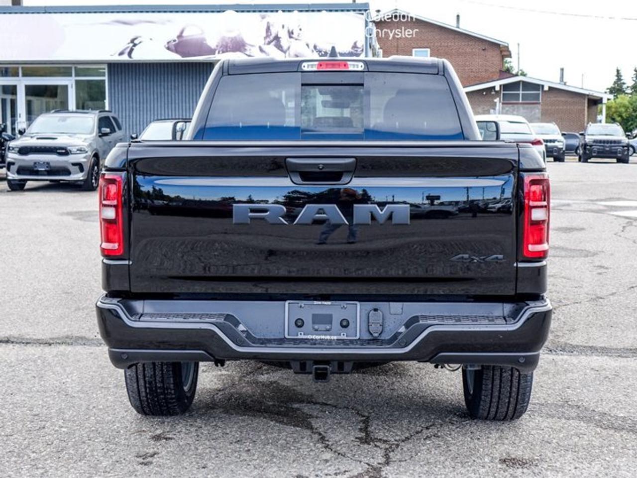 2027 RAM 1500 Express Quad Cab 6'4" Box 3.6L Pentastar V6 with eTorque | Customer Preferred Package 23D | 20" PolishedPainted Aluminum Wheel Photo