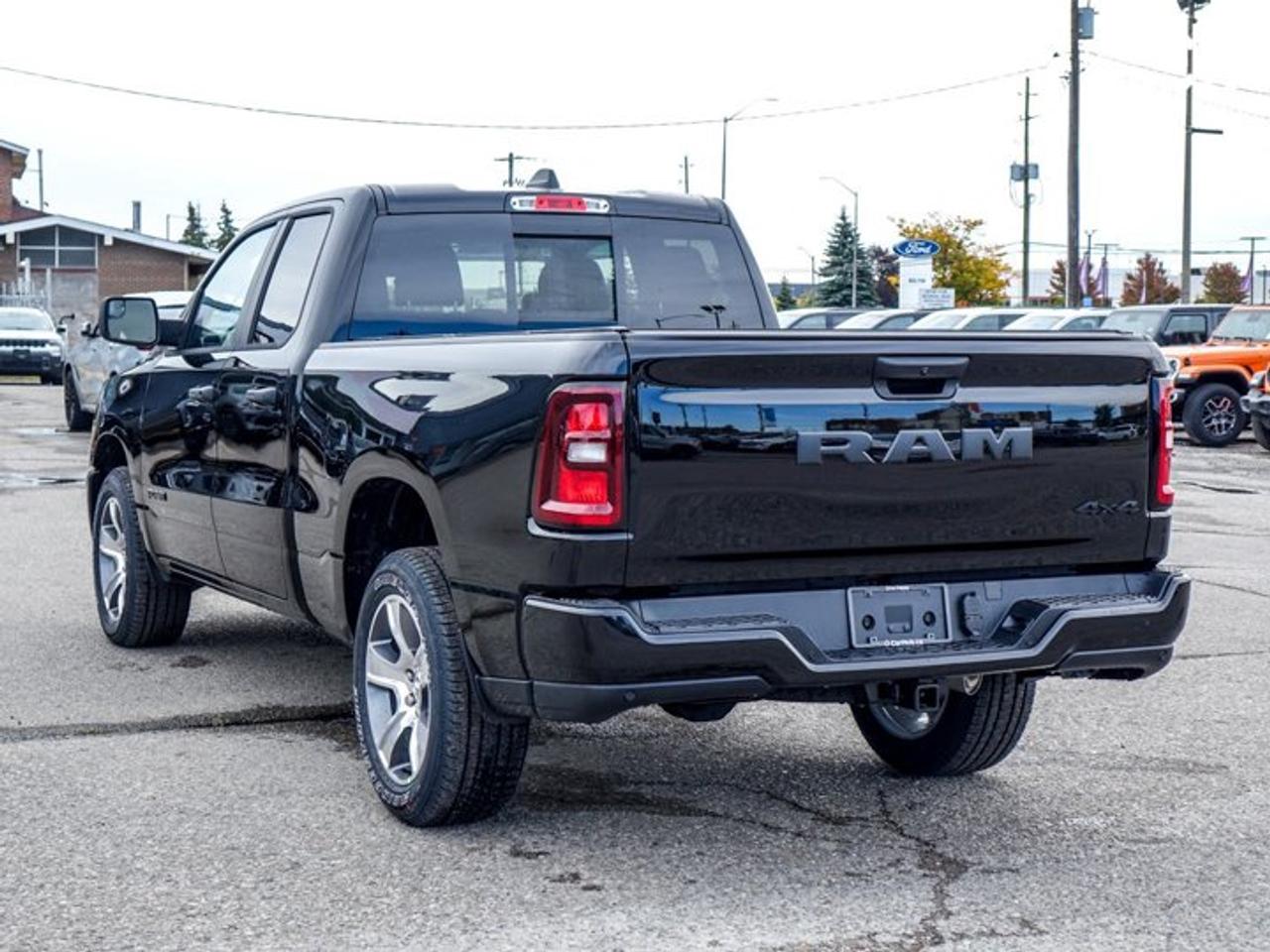 2027 RAM 1500 Express Quad Cab 6'4" Box 3.6L Pentastar V6 with eTorque | Customer Preferred Package 23D | 20" PolishedPainted Aluminum Wheel Photo
