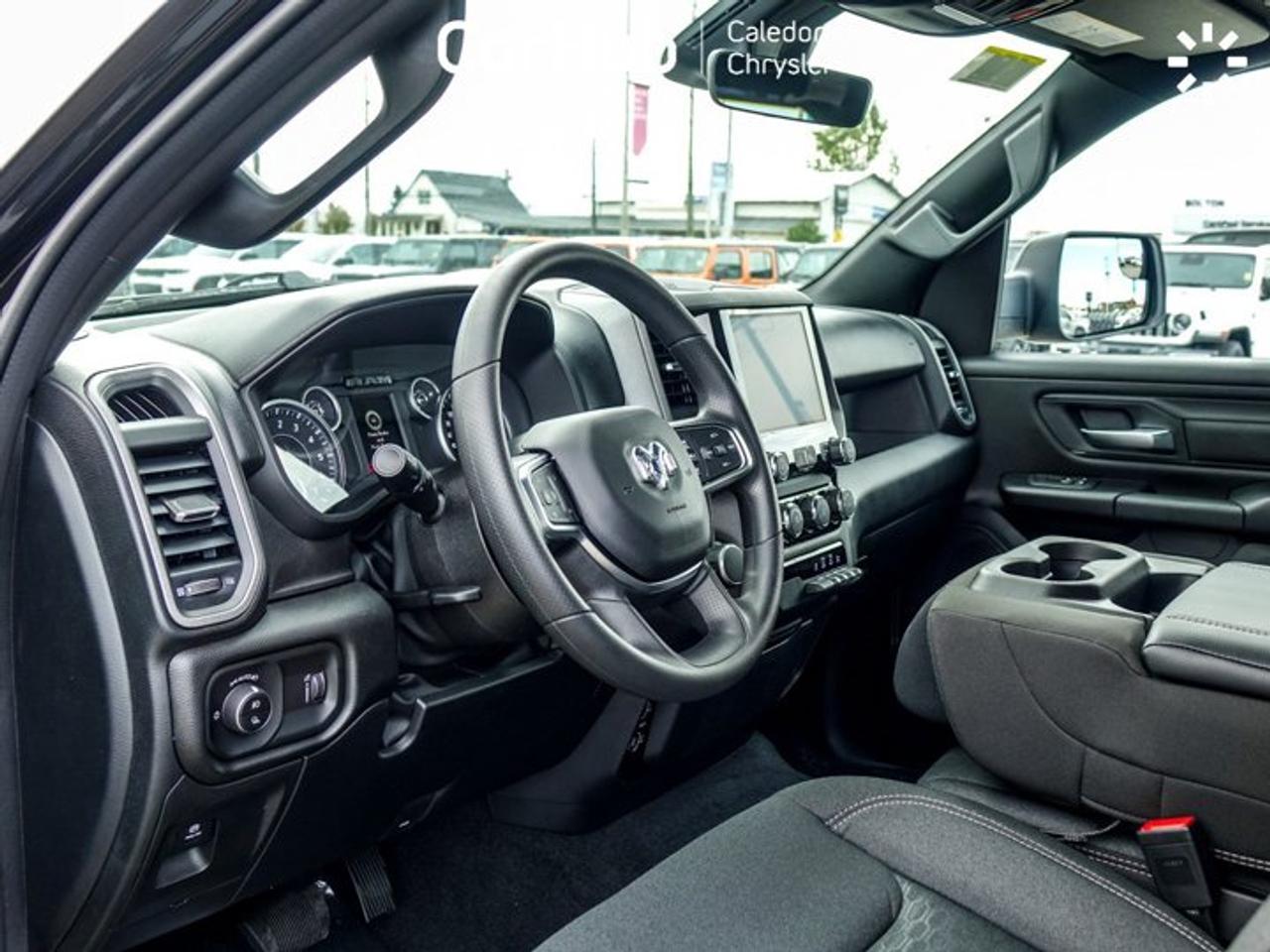2027 RAM 1500 Express Quad Cab 6'4" Box 3.6L Pentastar V6 with eTorque | Customer Preferred Package 23D | 20" PolishedPainted Aluminum Wheel Photo