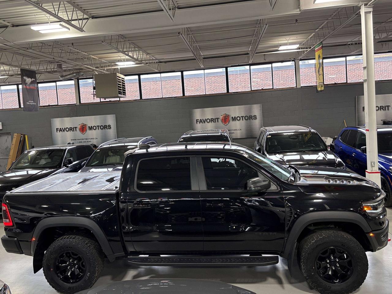 2023 RAM 1500 TRX|V8SUPERCHARGED|NOLUXTAX|HARMANKARDON|NAV|HUD|+ Photo