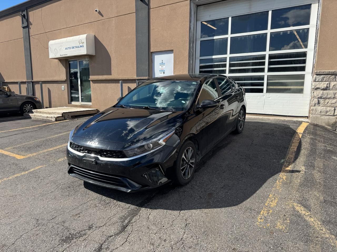 Black 2023 Kia Forte Sedan Continuously Variable Transmission