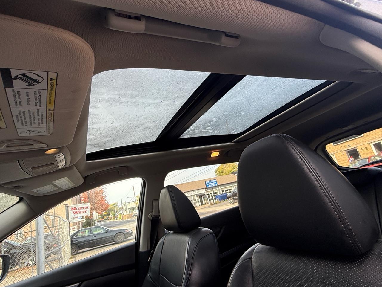 2015 Nissan Rogue AWD 4dr S Photo
