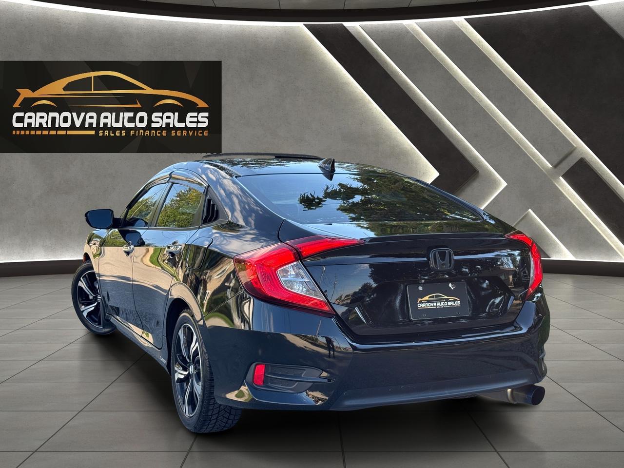 2016 Honda Civic Touring+Leather+Roof+GPS+Adaptive Crise+LKA Photo
