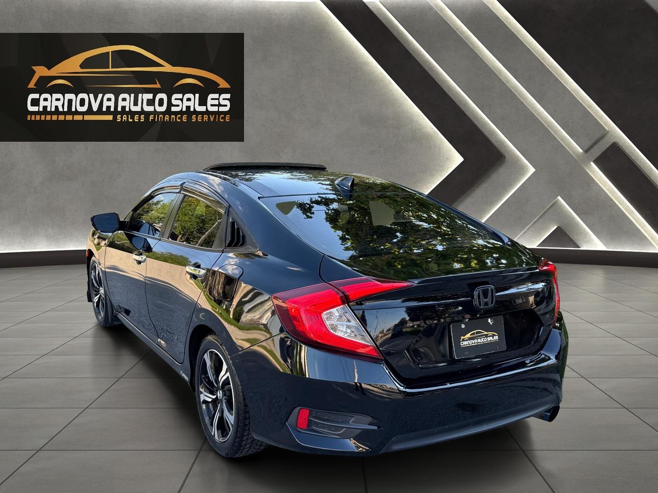 2016 Honda Civic Touring+Leather+Roof+GPS+Adaptive Crise+LKA Photo