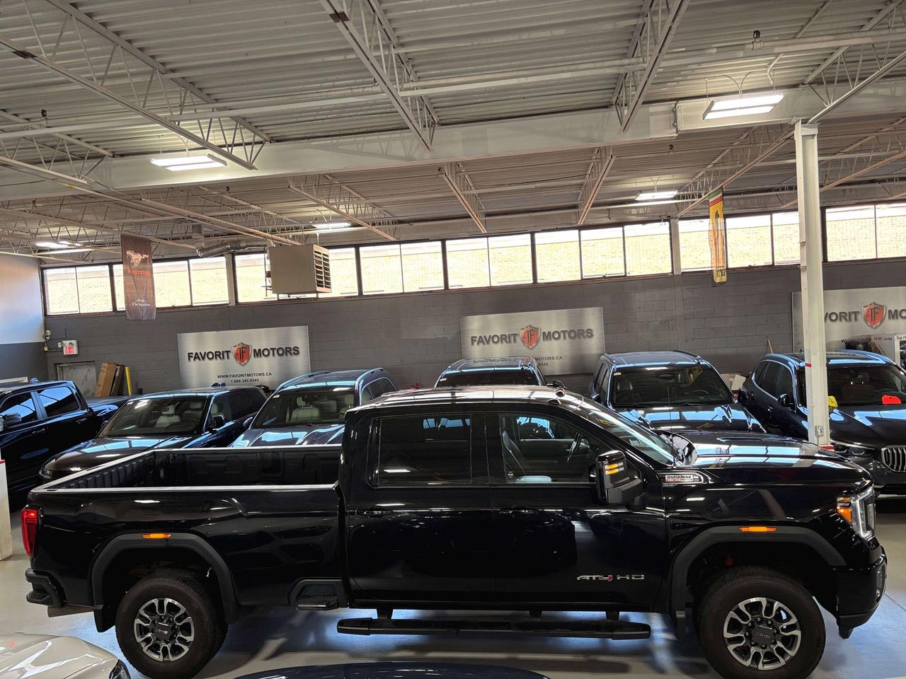 2023 GMC Sierra 2500 HD AT4|AWD|DURAMAX|NAV|BOSE|LEATHER|BEDLINER|SIDESTEP Photo4