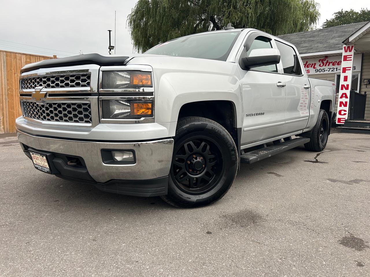 Silver 2015 Chevrolet Silverado 1500 Pickup Truck Four-Wheel Drive Automatic
