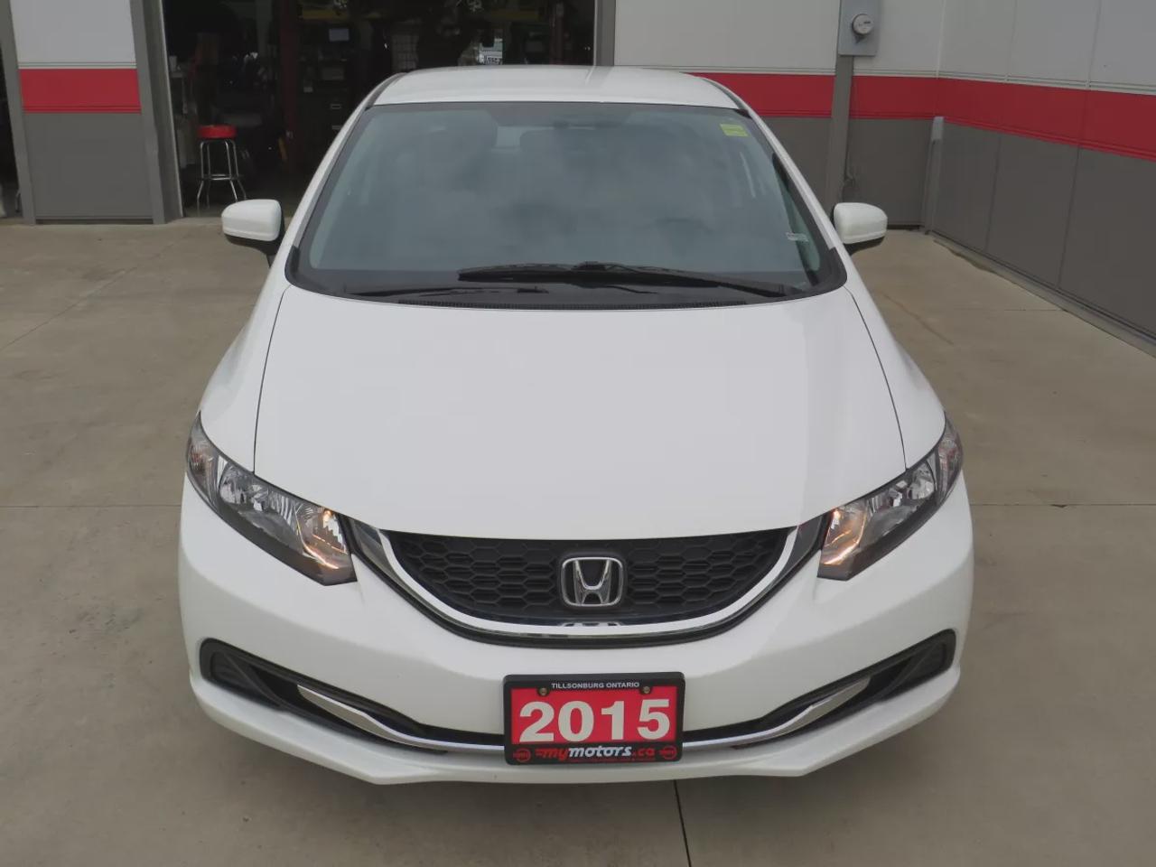 2015 Honda Civic Sedan LX | LOW KM!! | FWD | Automatic | Heated Seats | Air Conditioning | Bluetooth | Back-Up Camera | Cruise Control | Steering Wheel Audio Controls | USB Input | Keyless Entry | Power Windows | Power Door Locks | Heated Power Mirrors Photo
