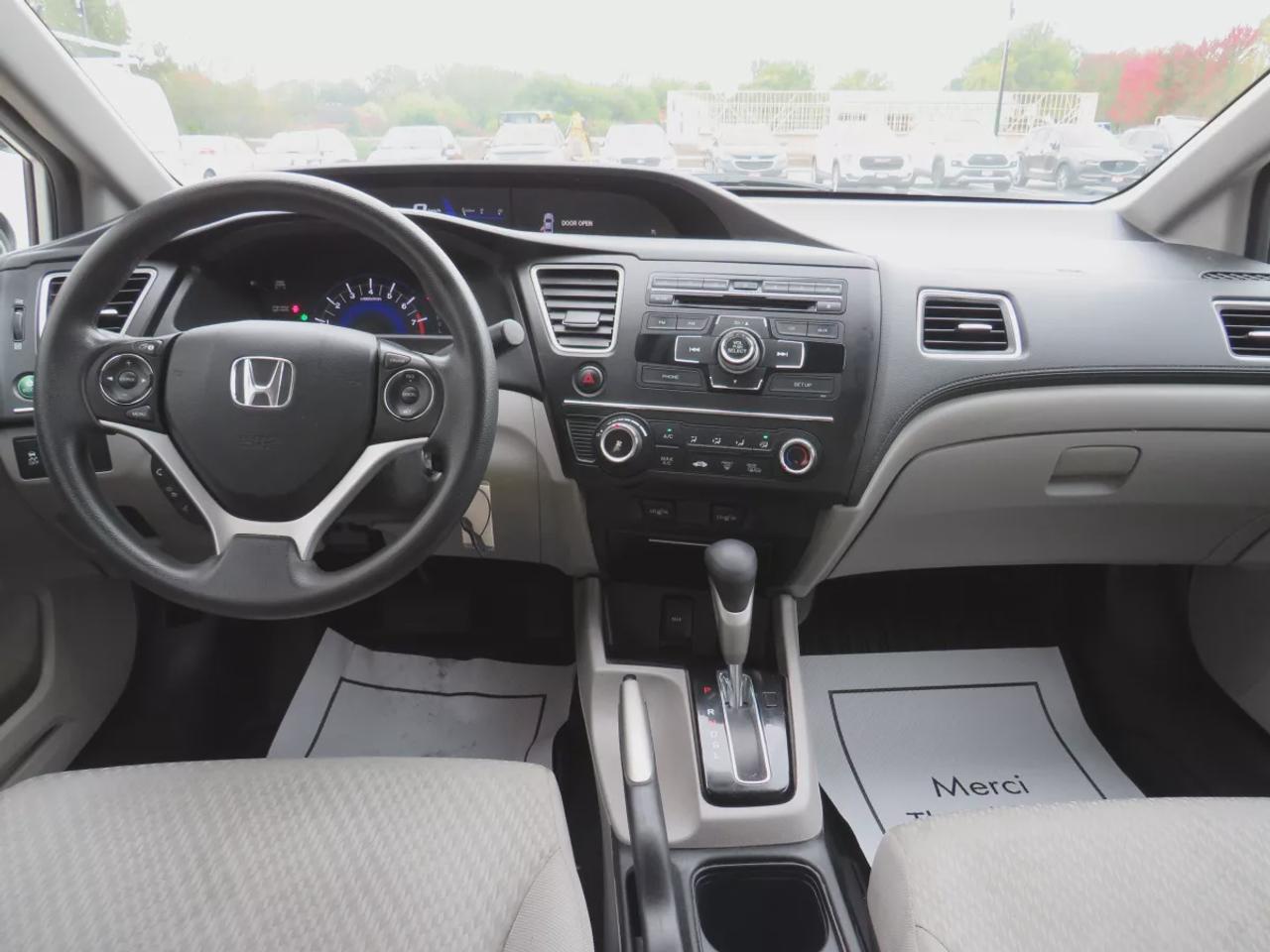 2015 Honda Civic Sedan LX | LOW KM!! | FWD | Automatic | Heated Seats | Air Conditioning | Bluetooth | Back-Up Camera | Cruise Control | Steering Wheel Audio Controls | USB Input | Keyless Entry | Power Windows | Power Door Locks | Heated Power Mirrors Photo