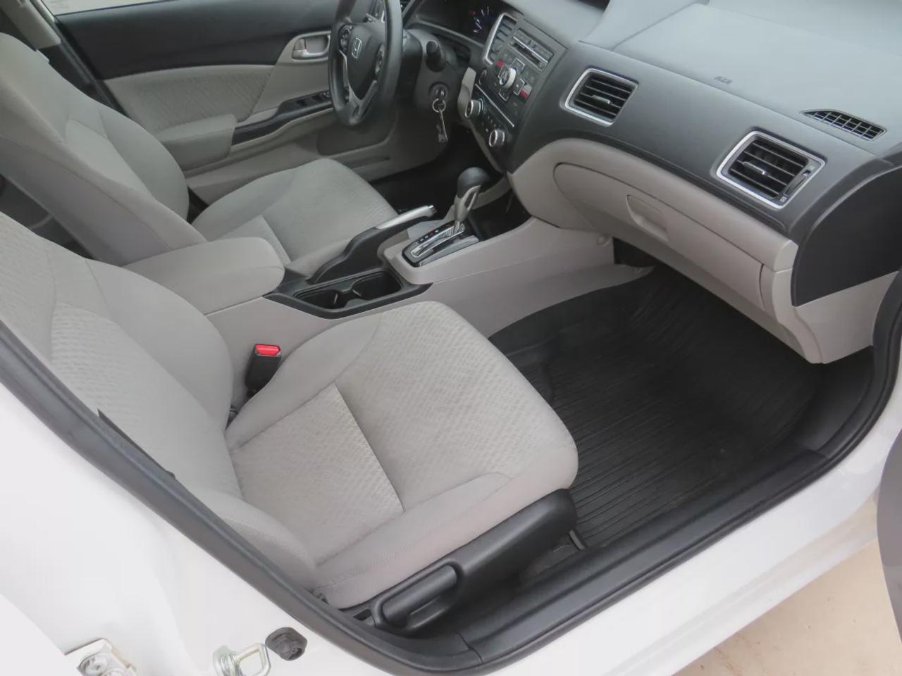 2015 Honda Civic Sedan LX | LOW KM!! | FWD | Automatic | Heated Seats | Air Conditioning | Bluetooth | Back-Up Camera | Cruise Control | Steering Wheel Audio Controls | USB Input | Keyless Entry | Power Windows | Power Door Locks | Heated Power Mirrors Photo