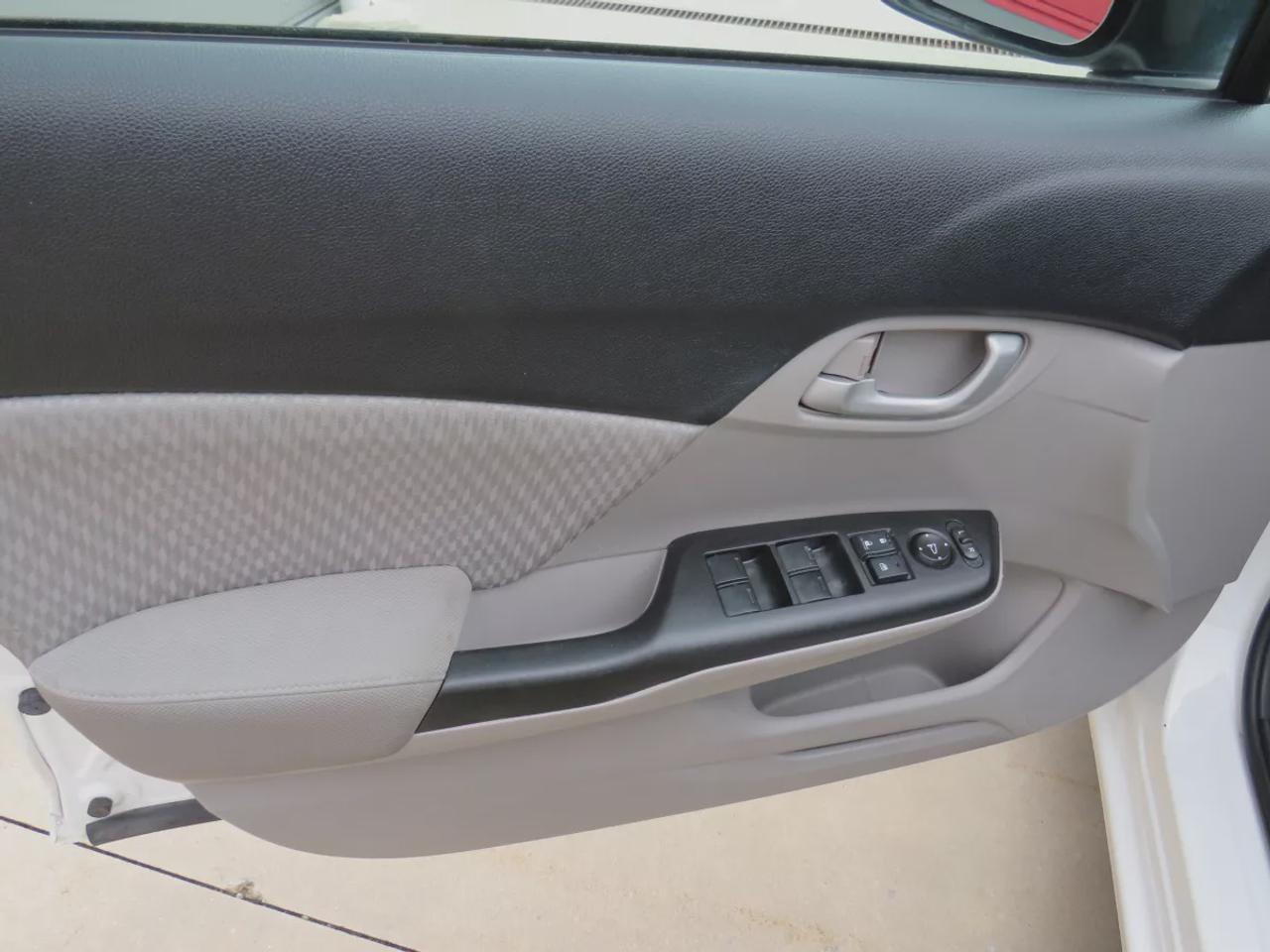 2015 Honda Civic Sedan LX | LOW KM!! | FWD | Automatic | Heated Seats | Air Conditioning | Bluetooth | Back-Up Camera | Cruise Control | Steering Wheel Audio Controls | USB Input | Keyless Entry | Power Windows | Power Door Locks | Heated Power Mirrors Photo